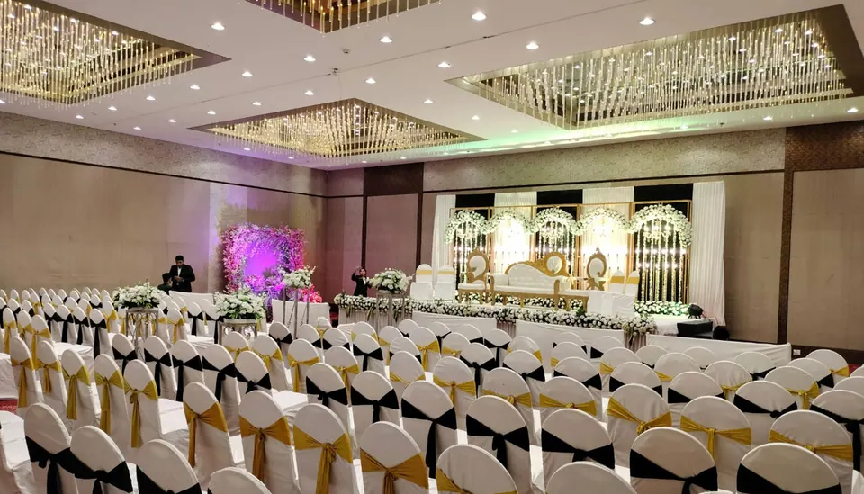 Wedding seating and floral stage at Galaxy Banquet